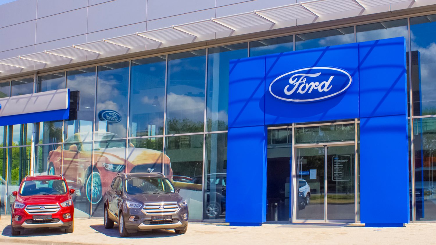 Ford cuts stock bonuses for half of its middle managers, aiming to boost performance and cut costs amid ongoing financial challenges.