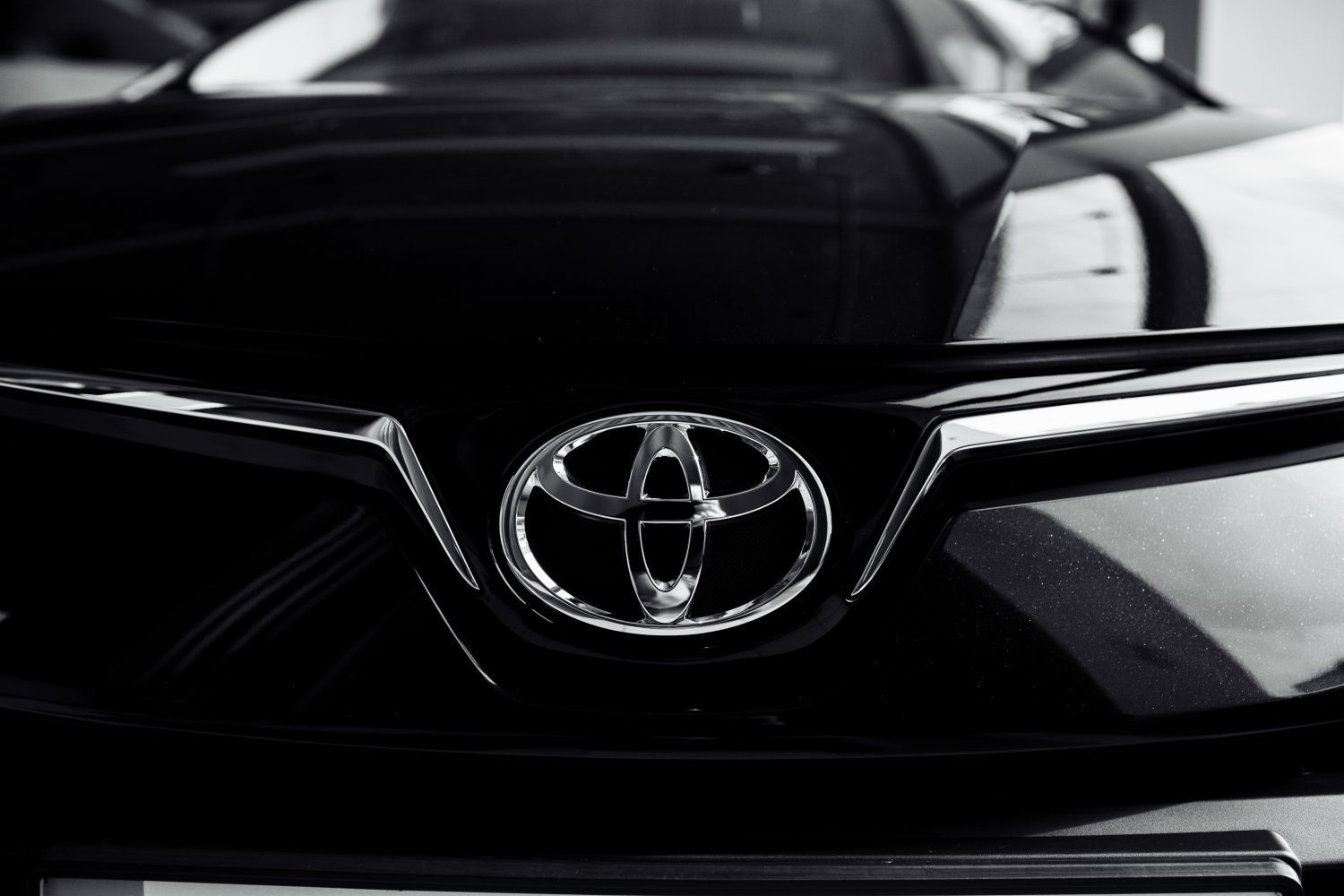 Toyota reported a drop in operating profit for the June quarter, driven largely by U.S. tariffs on imported vehicles and currency fluctuations
