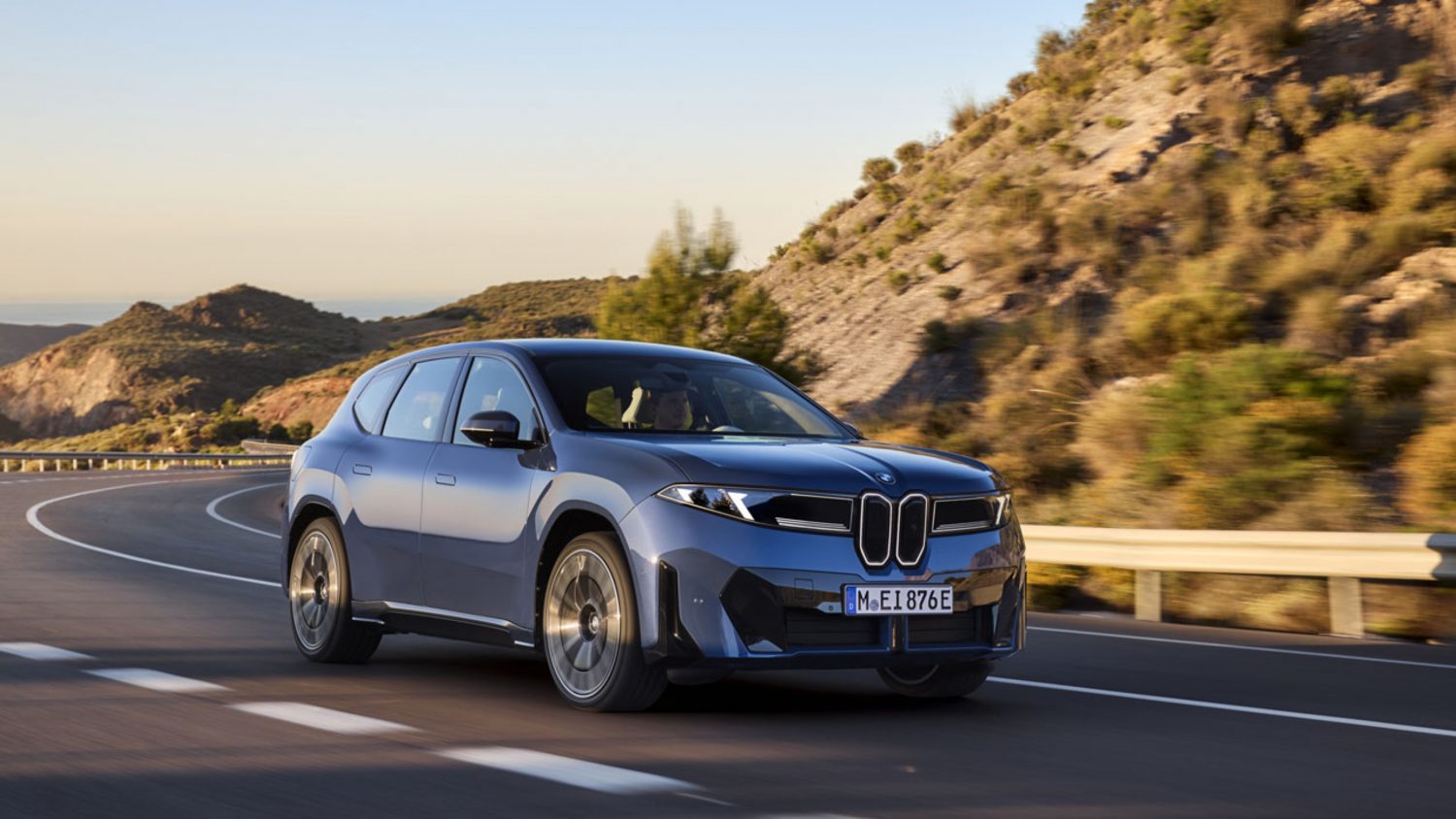 BMW unveils the iX3 SUV with a new software-driven platform, aiming to compete with Tesla and Chinese EV rivals.