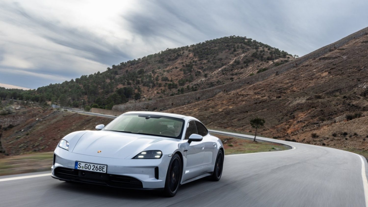 Porsche delays EV launches, expands hybrid and combustion lineup, cutting Volkswagen’s profit outlook amid weak demand and tariffs.