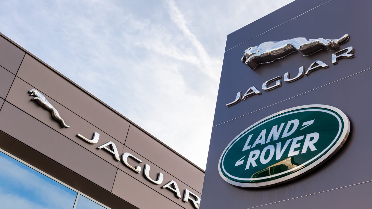 Britain pledges $2 billion loan guarantee as JLR resumes factories after a month-long cyberattack shutdown.